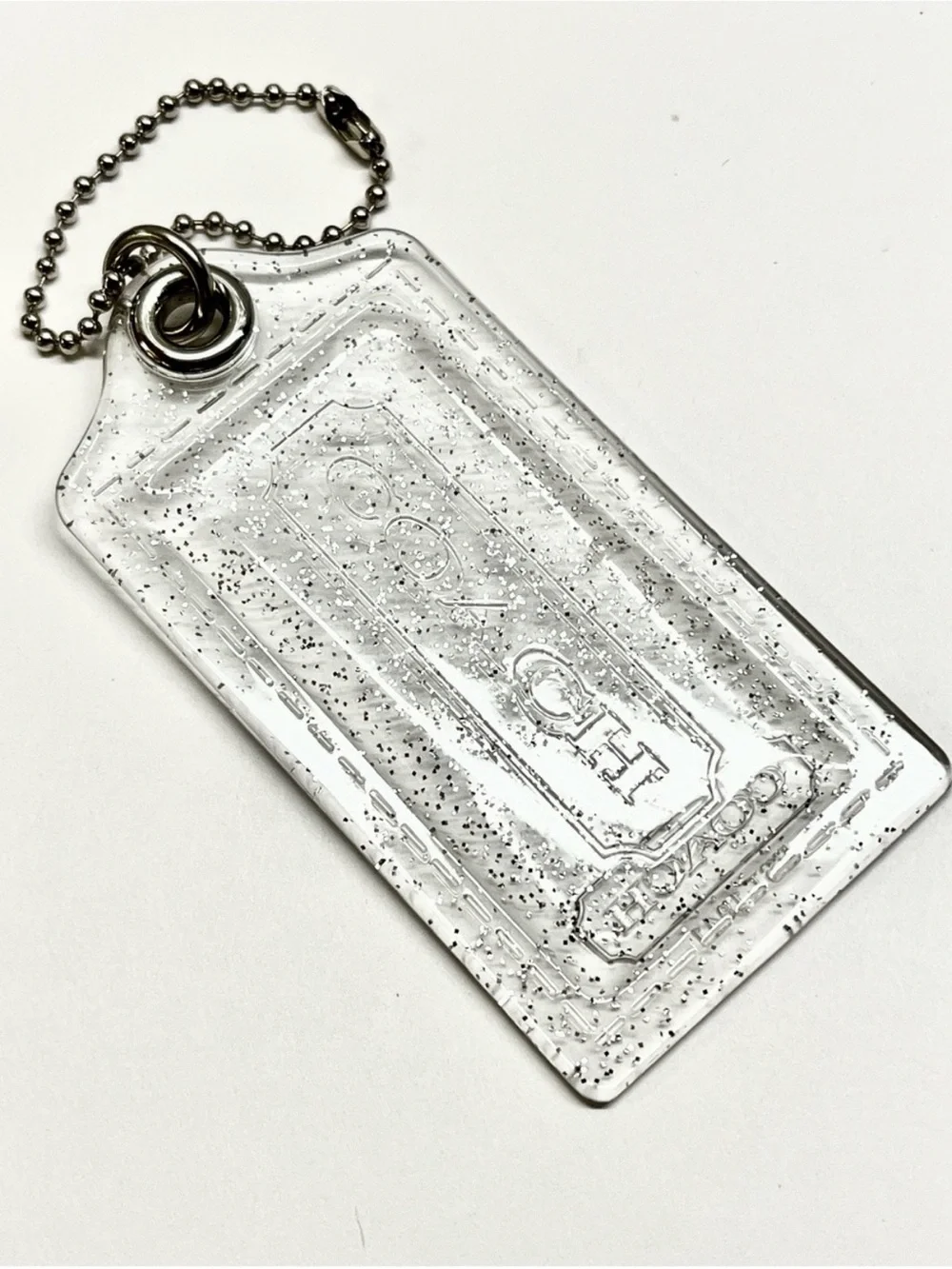 Coach Poppy Clear Glitter Hang Tag 3 1/2 inches long EUC